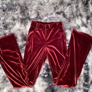 High-waist red velvet pants